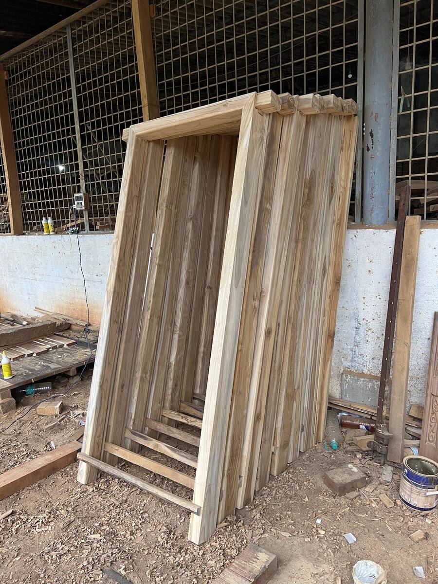 Teak door frame and shutters ready for dispatch, Sri Shiva Saw Mills
