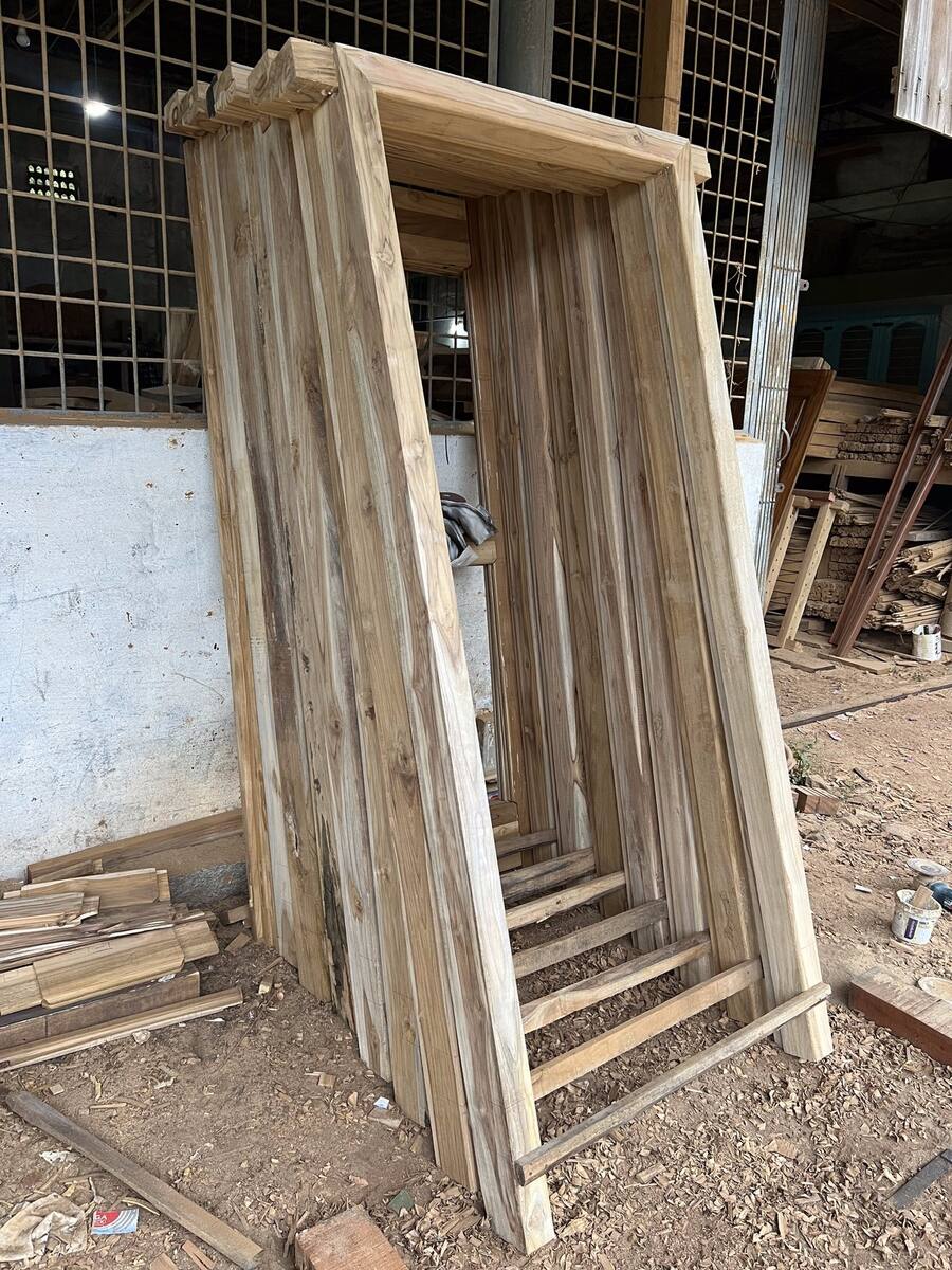 Wooden door frame, Sri Shiva Saw Mills workshop