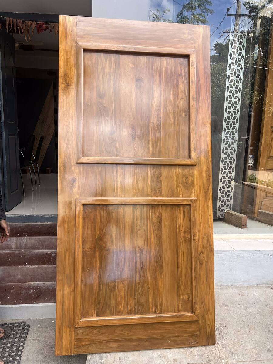 Finished teak door ready for installation