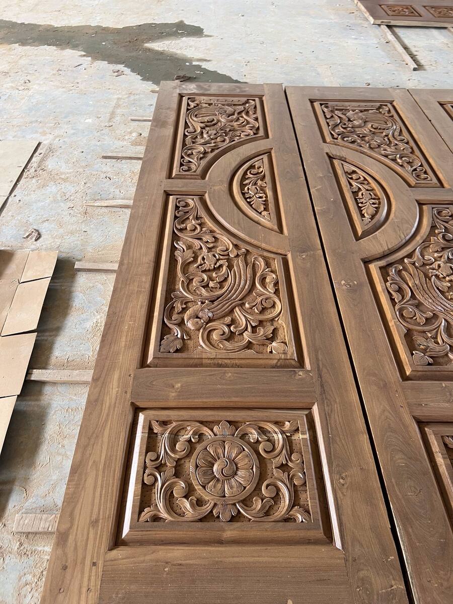 Finished teak door, Sri Shiva Saw Mills workshop